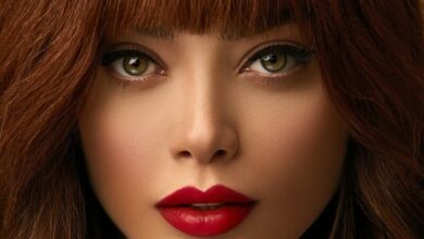 woman with red hair and black lipstick