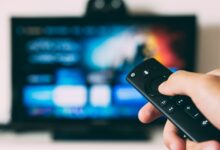 turned-on flat screen television