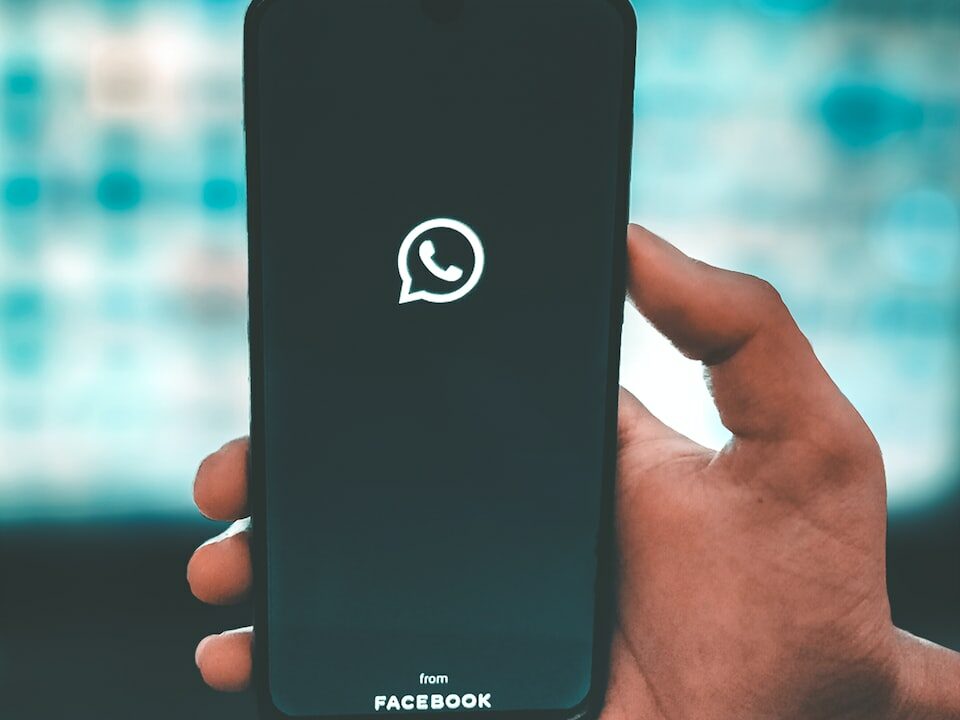 black iphone 7 plus on persons hand