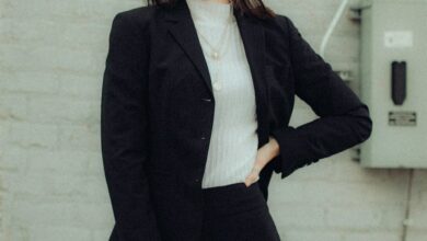woman in black blazer and black pants