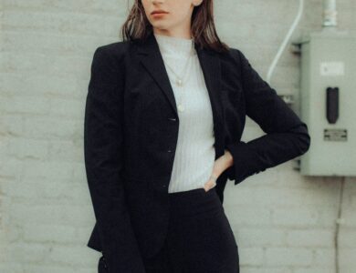 woman in black blazer and black pants