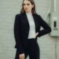 woman in black blazer and black pants