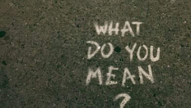 what do you mean? text on gray surface