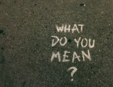 what do you mean? text on gray surface