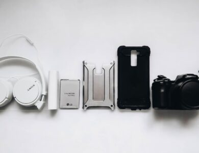 white Sony headphones and black smartphone case