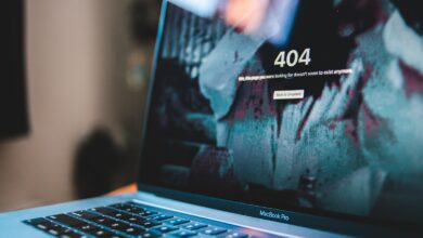 black asus laptop computer showing 3 00